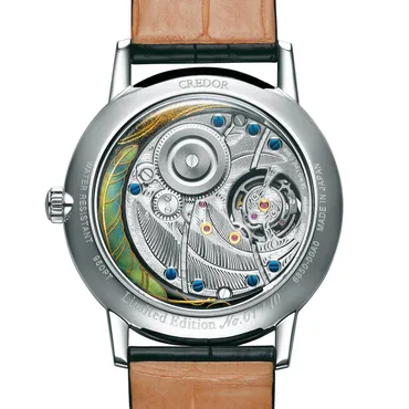 クレドール「ゴールドフェザー」トゥールビヨン限定腕時計、太陽の周りを飛翔する鳥を漆芸で 